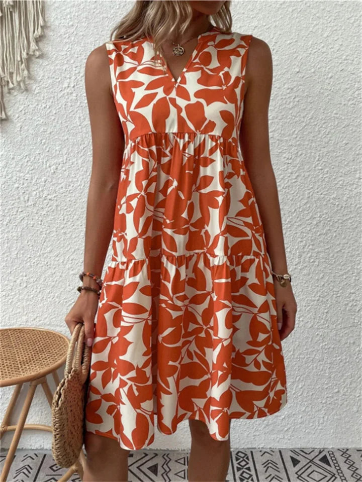 Nivara - Flared-Cut Polka-Dot Midi Dress