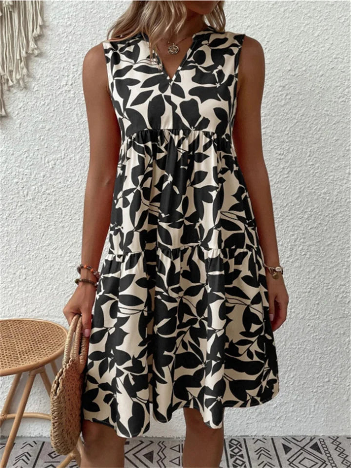 Nivara - Flared-Cut Polka-Dot Midi Dress
